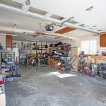 Large 2 car garage is extra deep to allow for a work bench and extra refrigerators.