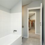 Primary Full Bathroom. Photo accuracy for floor plan and finishing. Virtually completed and staged.