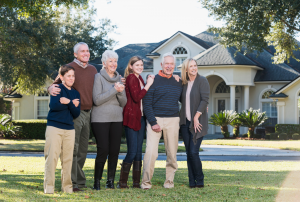 Family in front of home | Windermere Real Estate