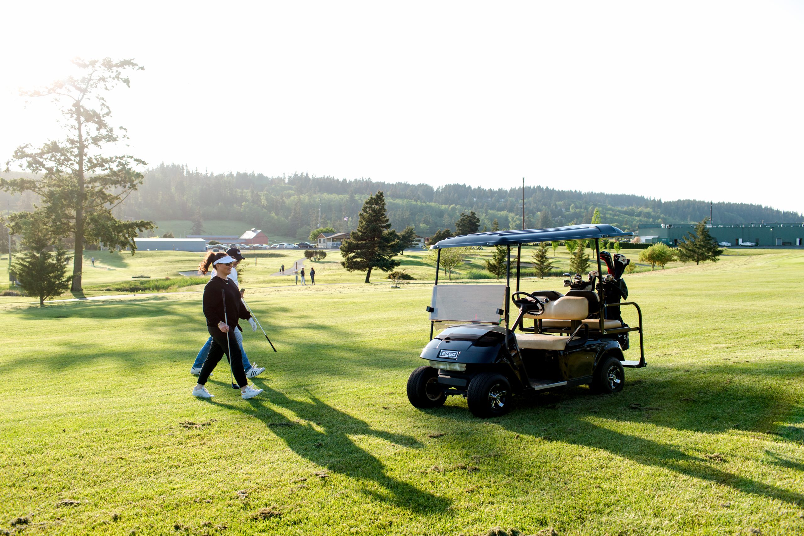 Golfers on golf course | Windermere Real Estate | Camano Island, WA